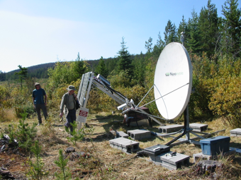 Nechako Seismic Station RAMB, showing typical station layout, with solar panels and satellite dish. Photo courtesy of J. Cassidy.