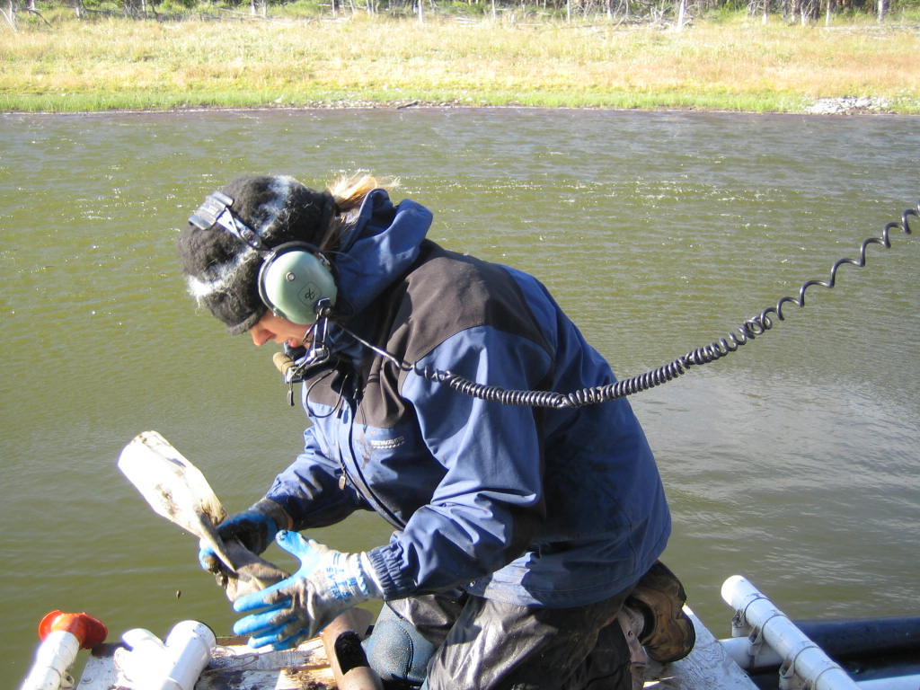 Recovering lake bottom sediment material - Photo Credit: W. Jackaman.